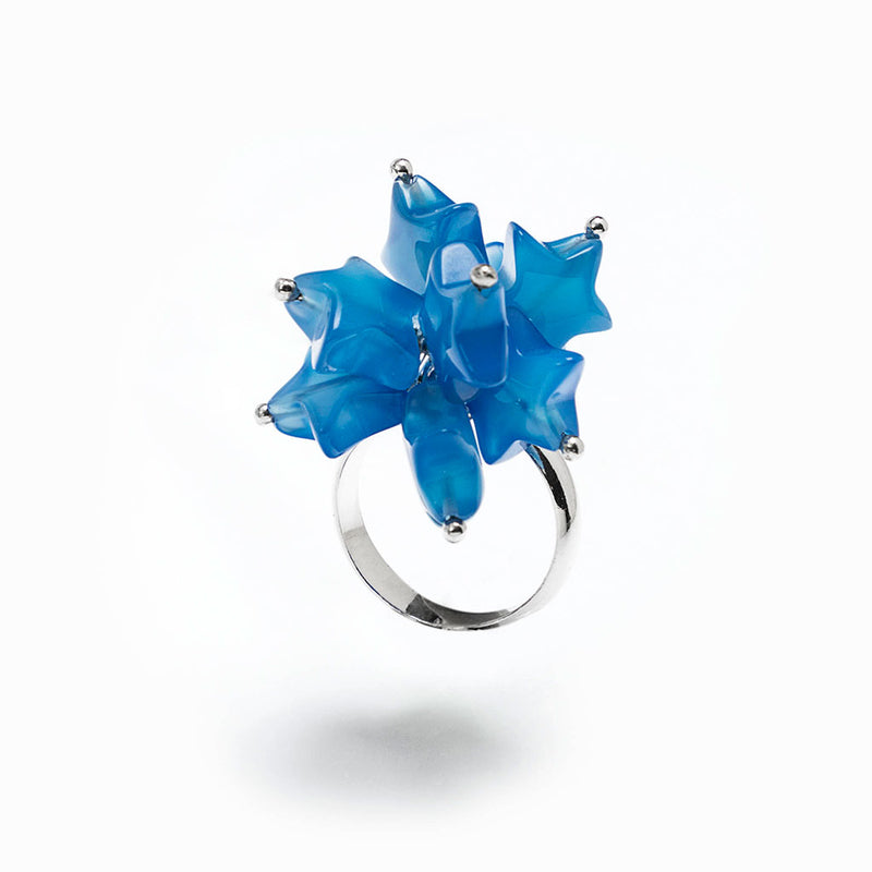 Anello in argento 925 rodiato e stelle mobili di agata blu