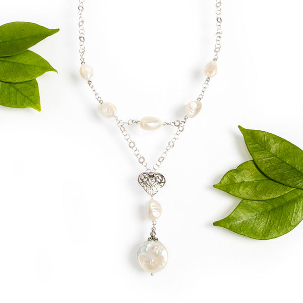 Collana con perle, catena e cuore traforato in argento 925